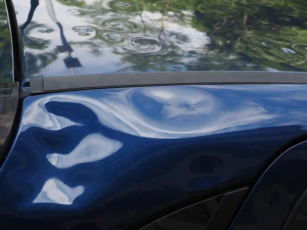 Premier Paintless Dent Repair at work